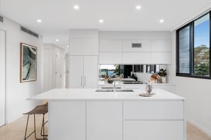 Fridge, microwave, oven, stovetop - DeJa Blue by Coast Hosting (Terrigal)