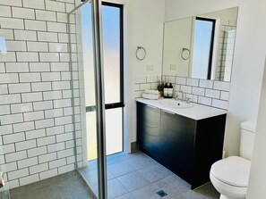 Bathtub, towels, shampoo