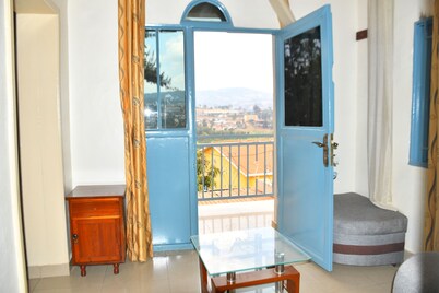 Cozy Double Room with Workspace and Private Bath in Kigali