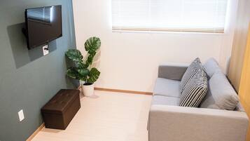 Elite Quadruple Room | Living area