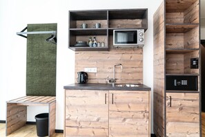 Estúdio superior | Cozinha privada | Micro-ondas em uma área comum