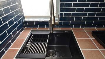 Fridge, microwave, stovetop, cookware/dishes/utensils