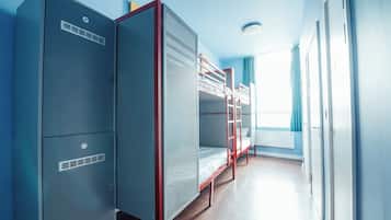 Desk, blackout curtains, bed sheets