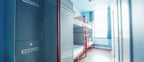 Desk, blackout drapes, bed sheets