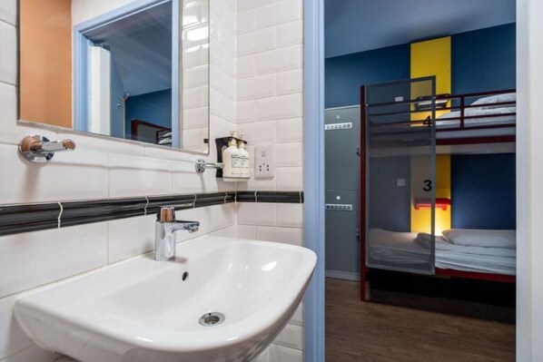 Bed in a 6 Bed Female Ensuite | Bathroom | Shower, soap, shampoo, toilet paper - Kabannas Liverpool (Liverpool)