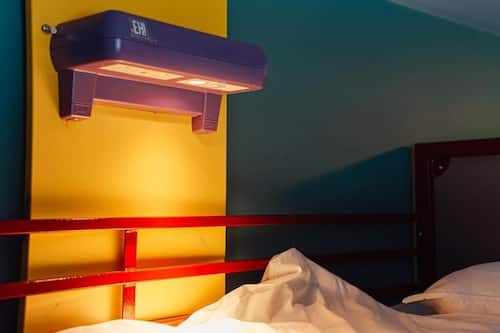 Desk, blackout curtains, bed sheets