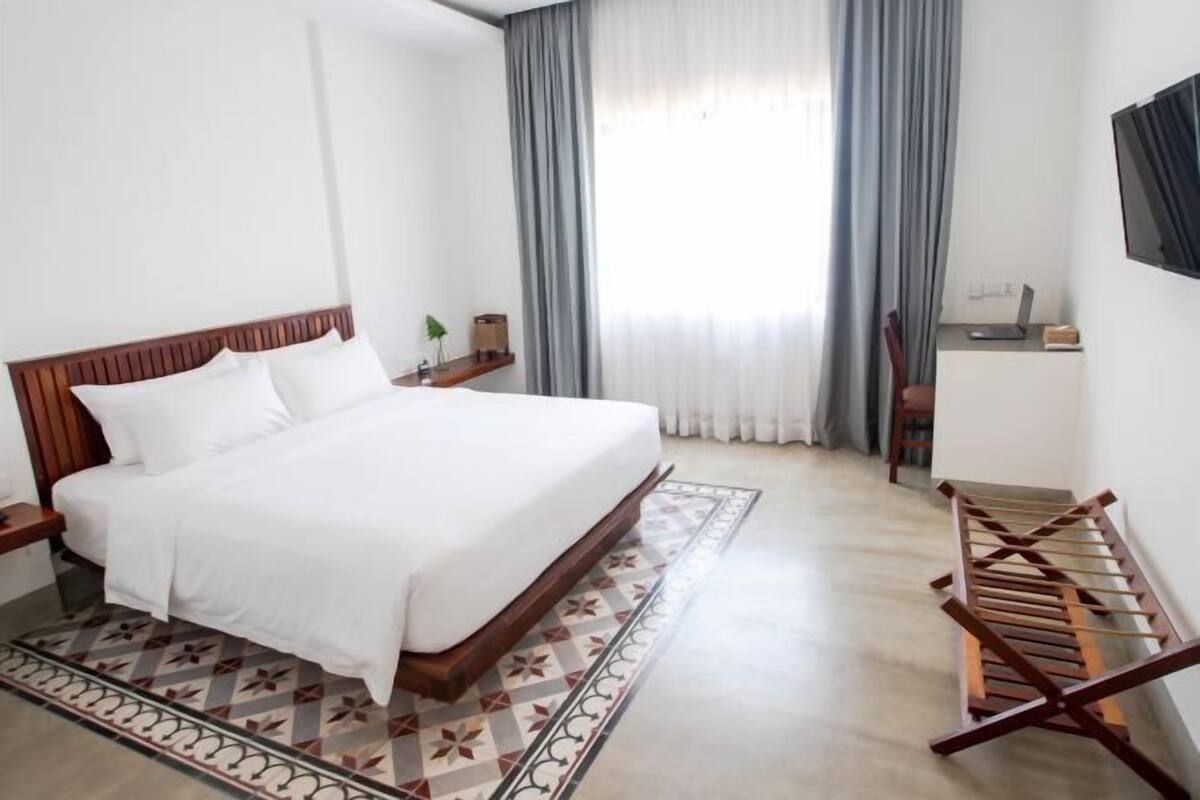Premium bedding, down comforters, pillowtop beds, minibar