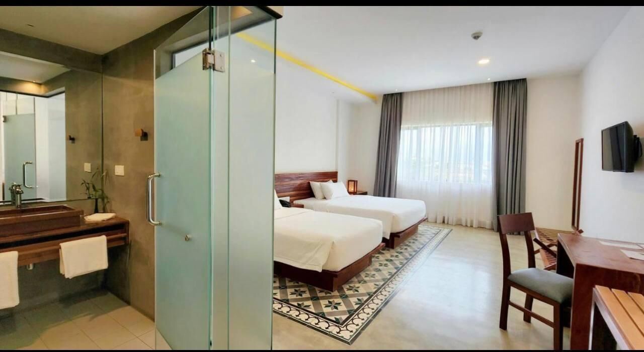 Chambre Deluxe avec lits jumeaux, Plusieurs lits, vue sur la ville | Literie de qualité, couette en duvet, lit avec matelas à plateau-coussin