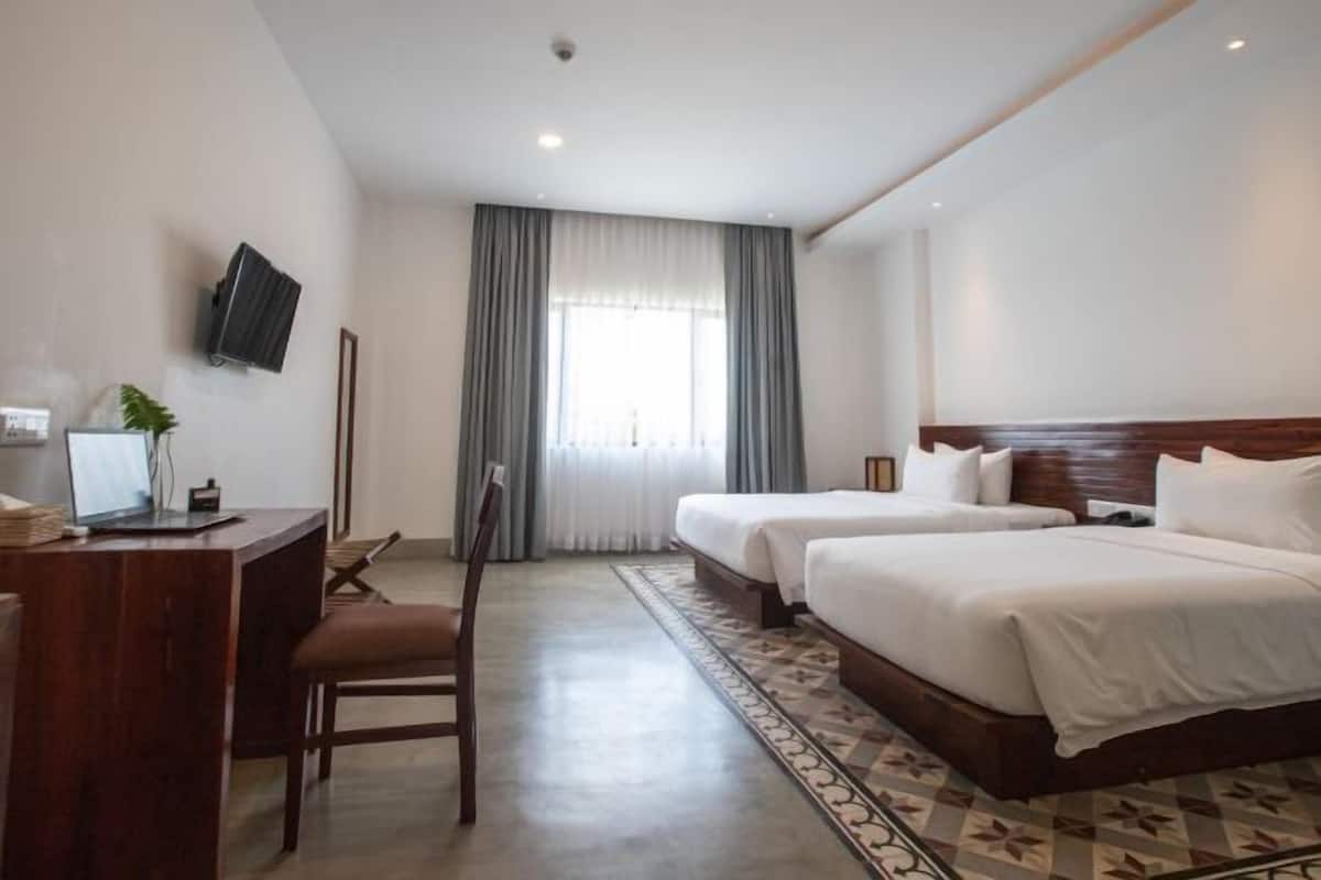 Ropa de cama de alta calidad, edredón, camas con pillow-top y minibar
