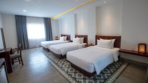 Deluxe Family, Triple Room, Pool View | Premium bedding, down comforters, pillowtop beds, minibar - DACO Hotel (Siem Reap)