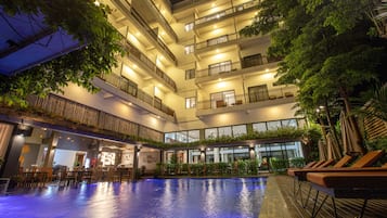 Outdoor pool, open 7:00 AM to 9:00 PM, pool umbrellas
