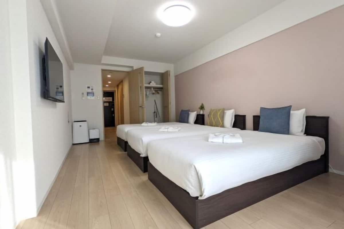 Blackout drapes, soundproofing, free WiFi, bed sheets