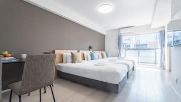Blackout curtains, soundproofing, free WiFi, bed sheets