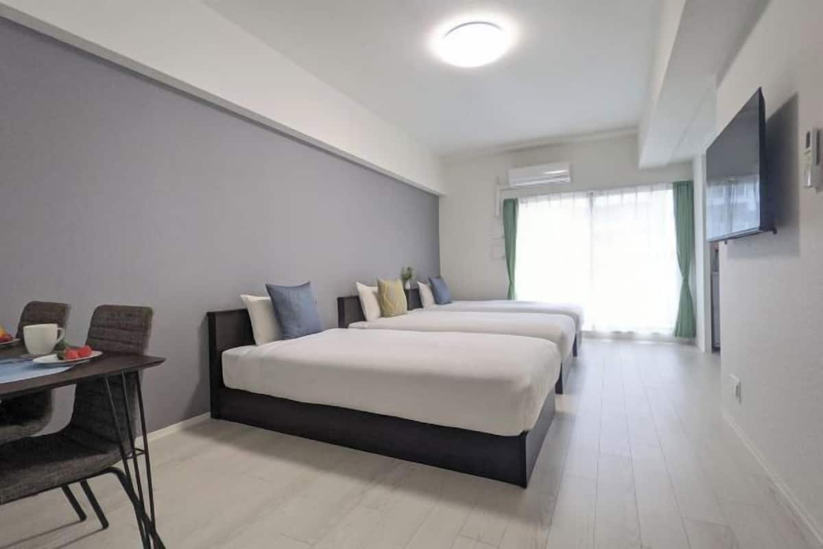 Blackout drapes, soundproofing, free WiFi, bed sheets