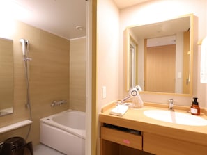 Hair dryer, slippers, bidet, towels