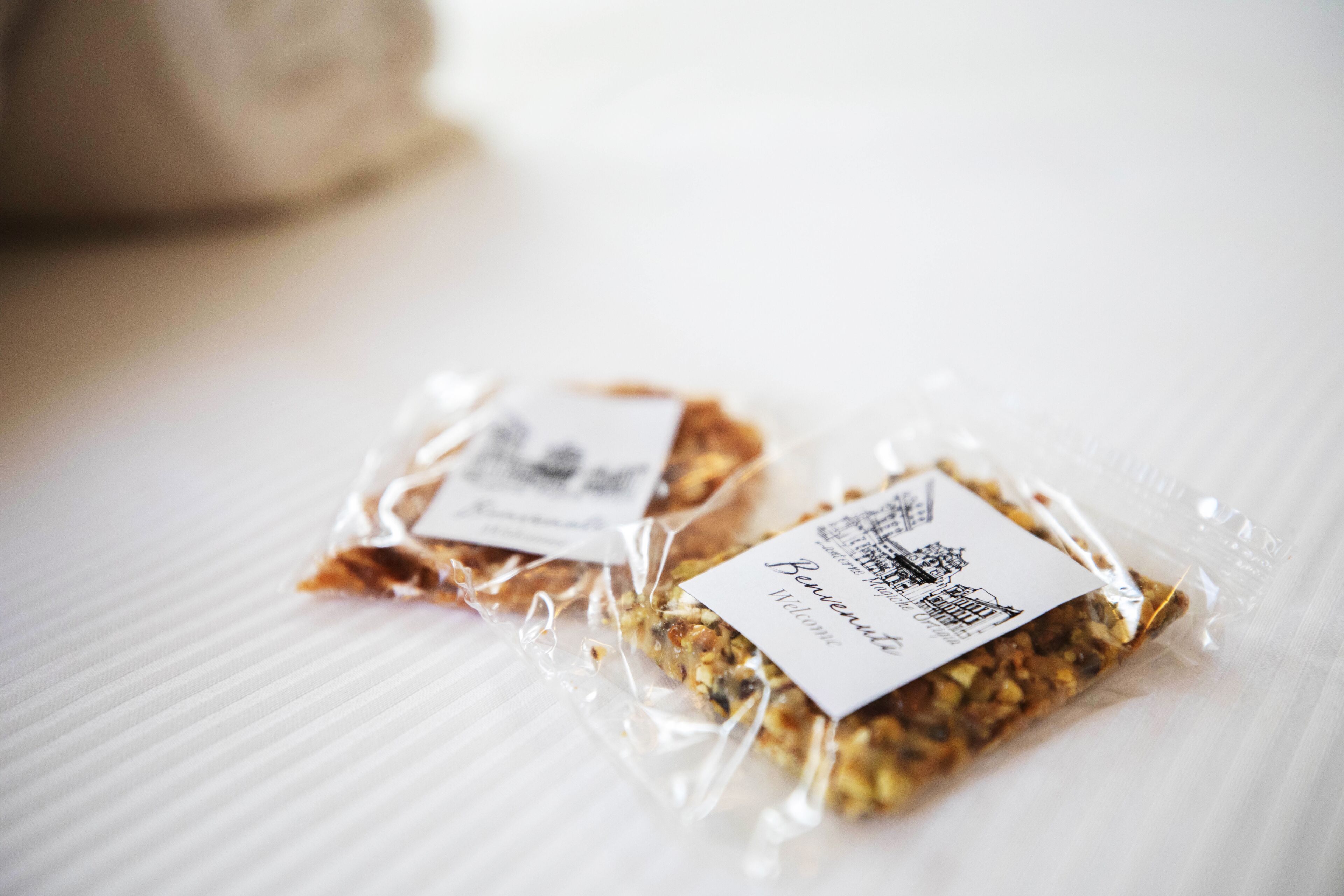 Two packaged food items on a white surface.