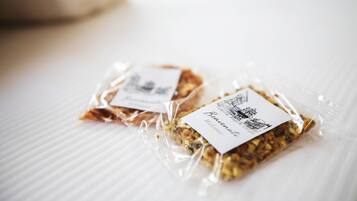 Two packaged food items on a white surface.