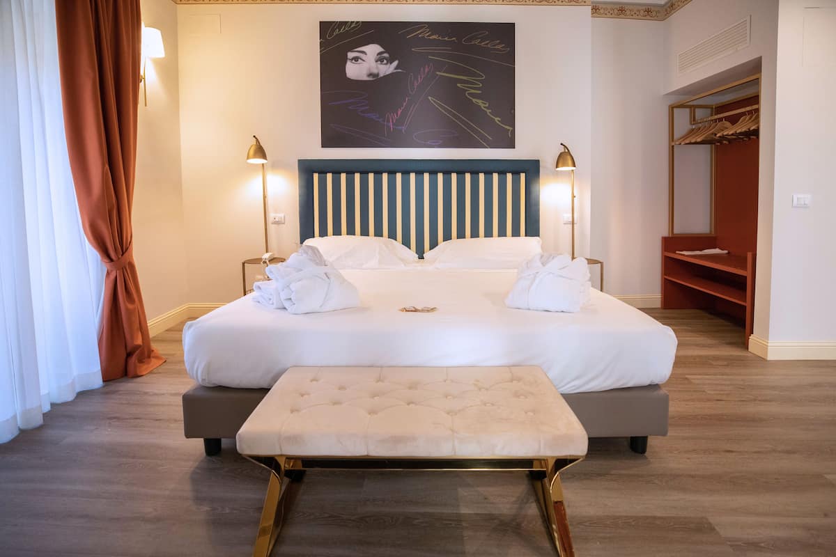 Suite Deluxe, balcón | 1 dormitorio, sábanas italianas Frette, ropa de cama de alta calidad