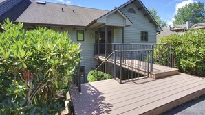 A single-story house with a front porch, a small deck, and a covered entryway. - Chetola Resort, Pine #3, in Blowing Rock (Blowing Rock)