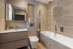 Apartment | Bathroom | Shower, deep soaking tub, hair dryer, towels