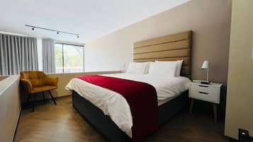 1 habitación, tabla de planchar con plancha, wifi y ropa de cama