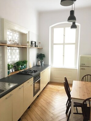Fridge, oven, dining tables
