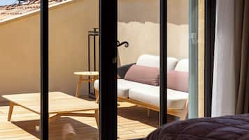 Suite de lujo | 1 habitación, minibar, caja de seguridad en la habitación y escritorio