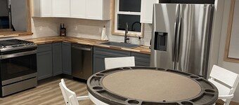 Totally remodeled cabin, a street from the snowmobile/ORV trail with parking.