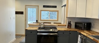 Totally remodeled cabin, a street from the snowmobile/ORV trail with parking.