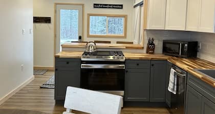 Totally remodeled cabin, a street from the snowmobile/ORV trail with parking.