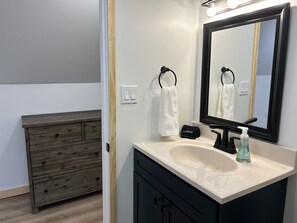 Hair dryer, towels, soap, shampoo