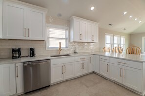 Fridge, microwave, oven, stovetop - Vitamin Sea in Nags Head: spacious, remodeled 5-bedroom, semi-oceanfront retreat with a private pool! (Nags Head)