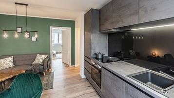 Deluxe Suite, 2 Bedrooms | Private kitchen | Fridge, oven, stovetop, dishwasher