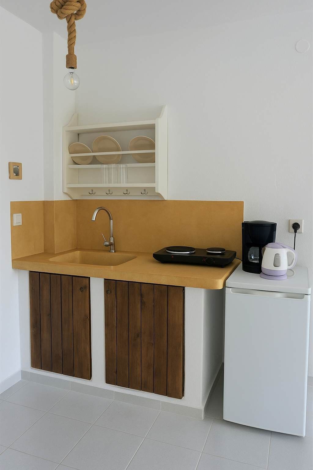 Fridge, coffee/tea maker, cookware/dishes/utensils