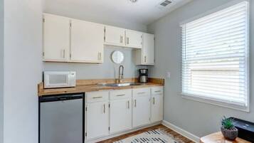 Fridge, microwave, coffee/tea maker, toaster