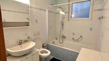 Eco-friendly toiletries, hair dryer, towels, soap