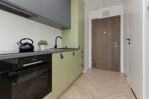 Monolocale, balcone | Cucina privata | Lavastoviglie, pentole/stoviglie/utensili