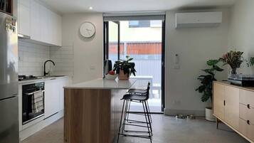 Basic Apartment, 1 Queen Bed | Private kitchen | Fridge, oven, stovetop, dishwasher