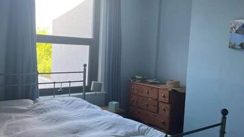 Basic House, Multiple Beds | 3 bedrooms, laptop workspace, iron/ironing board, bed sheets