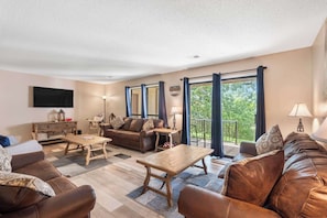 Condo, Multiple Beds, Patio, Garden View ( Mulligans Escape) | Living area | 42-inch flat-screen TV with digital channels - New Mulligans Escape - Community Pool (Branson)