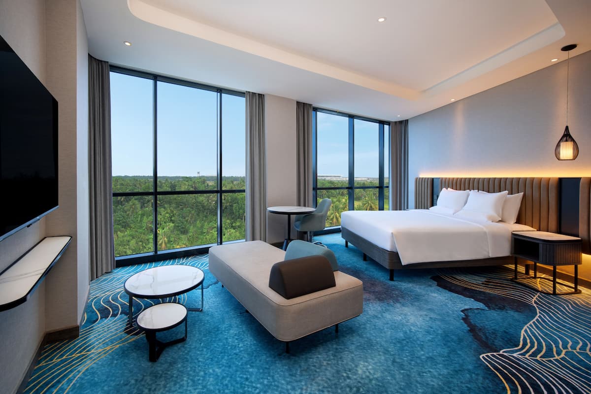 Executive kamer, 1 kingsize bed | Een bureau, geluiddichte muren, gratis wifi, beddengoed