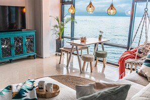 Living area - Full ocean view from entire condo. 2Beds/1bath with free parking (Jeju si, Jeju Island)