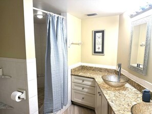 Combined shower/bathtub