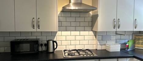 Fridge, microwave, oven, stovetop