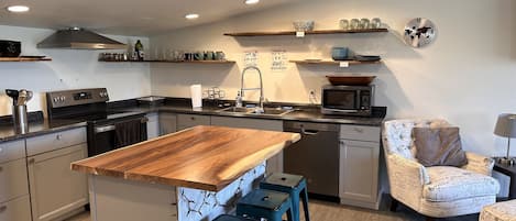 Fridge, microwave, cookware/dishes/utensils