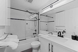 Shower, hair dryer, shampoo