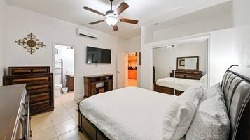 1 bedroom, desk, iron/ironing board, travel crib