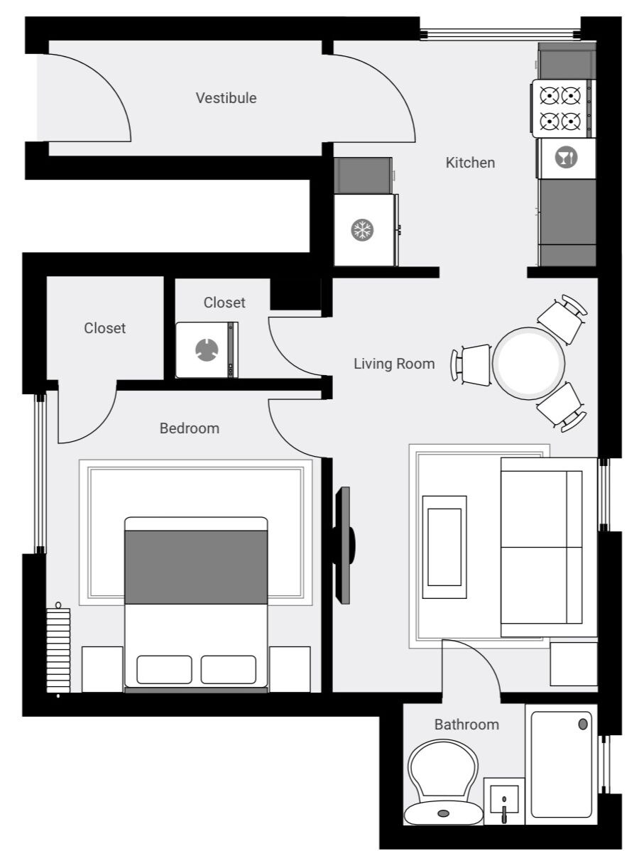 A floor plan with a bedroom, closet, living room, kitchen, bathroom, and vestibule.
