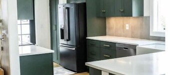 Newly Renovated 5 bedroom, 3 bath split level entry home in quiet neighborhood.