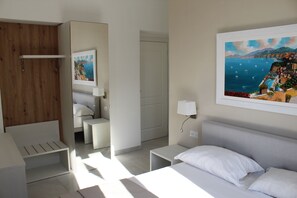 Habitación clásica | Escritorio, wifi gratis y ropa de cama